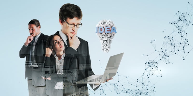 Ein Team aus drei Geschäftsleuten, die konzentriert und nachdenklich wirken, während sie zusammenarbeiten und digitale Technologien nutzen. Im Hintergrund ist eine Grafik, die ein Netzwerk darstellt, und über ihnen schwebt eine Glühbirne aus dem Wort 'IDEA', die Kreativität und Konzeption symbolisiert.